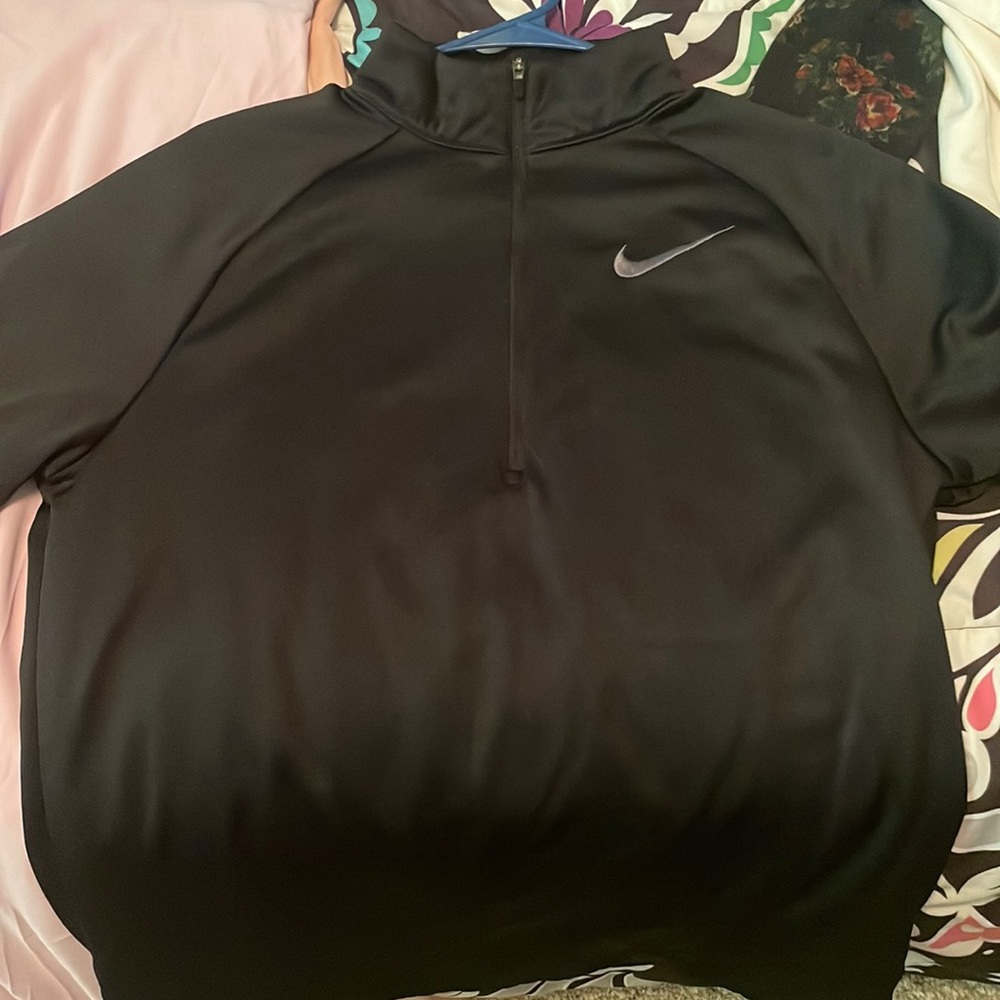 Size medium Nike dri-fit top.